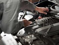 man repairing machine 